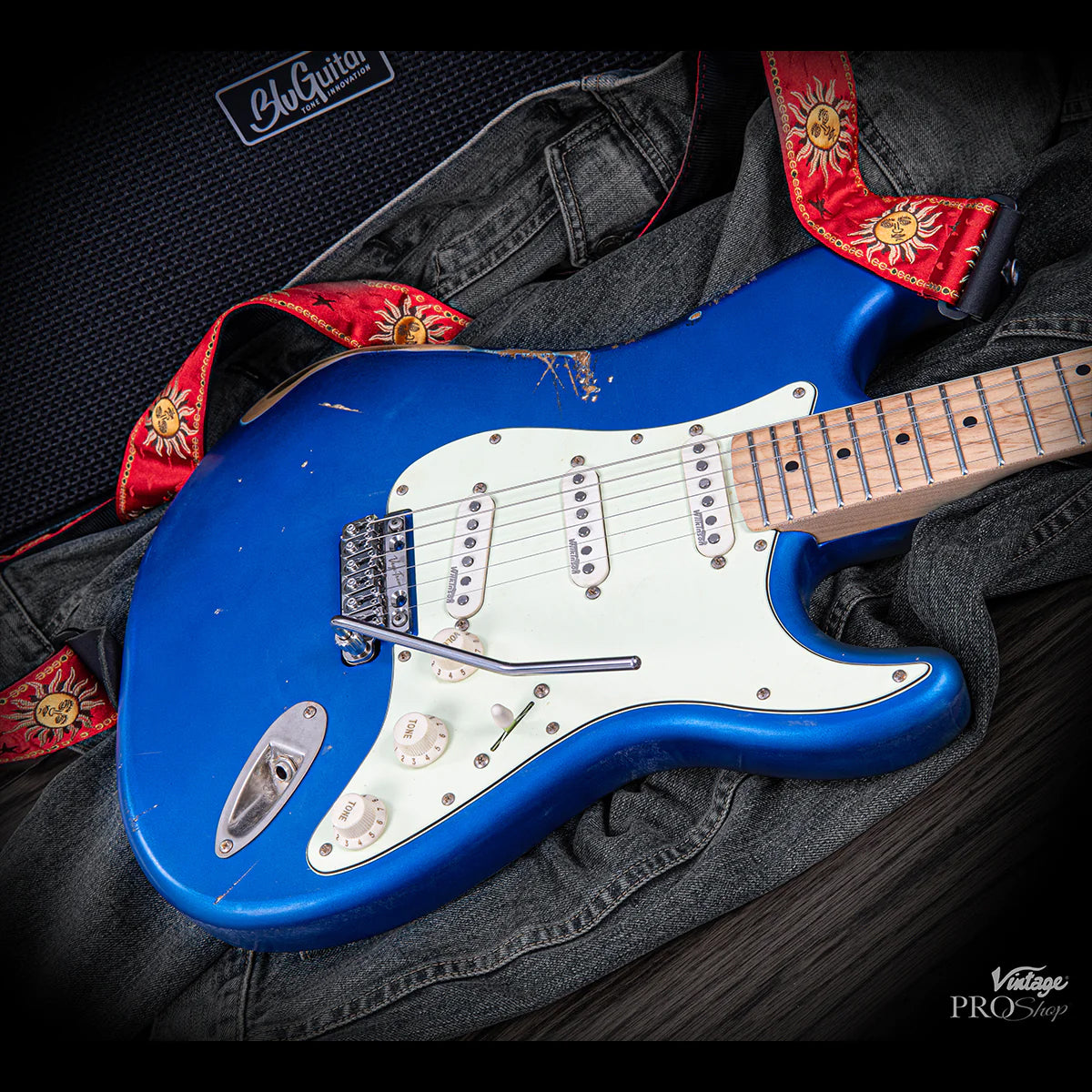 Vintage V130 Proshop Unique Guitar – AGED CANDY APPLE BLUE W/VEGA TREM